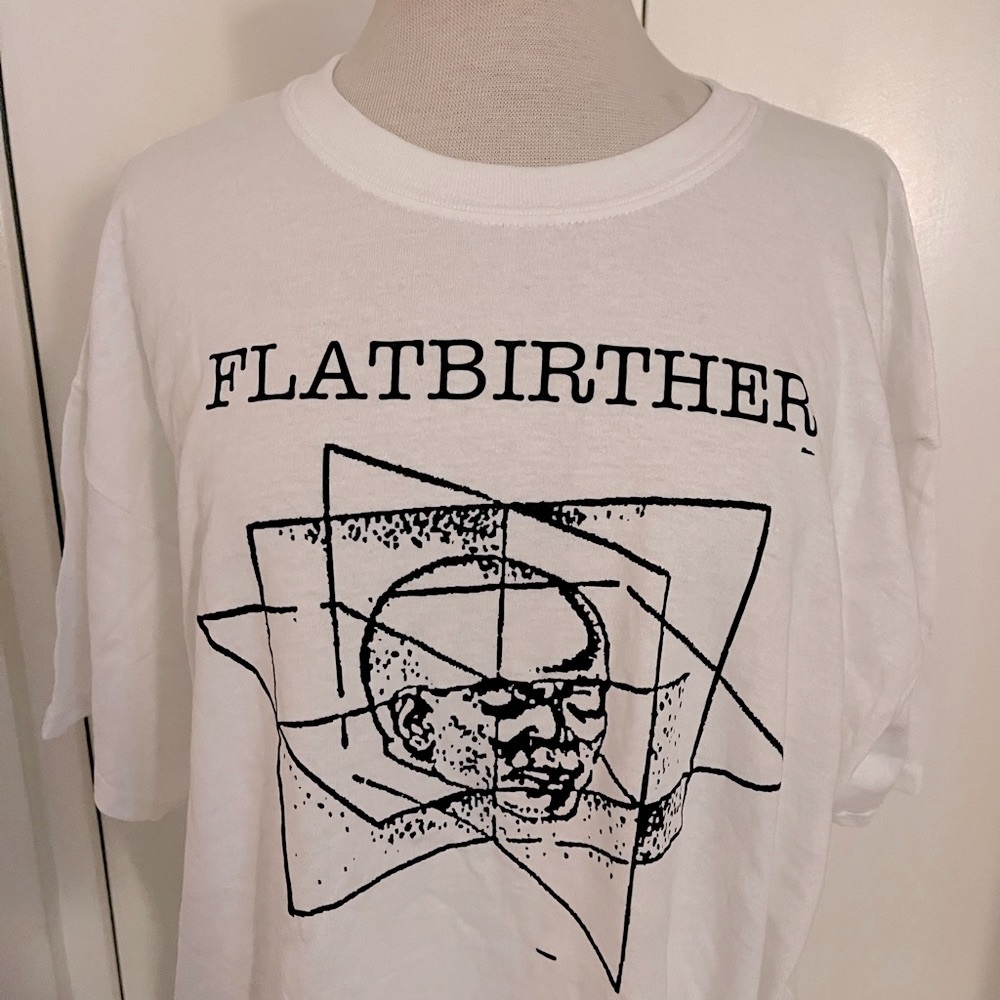 Cedric Bixler-Zavala’s “Flatbirther” T-shirt